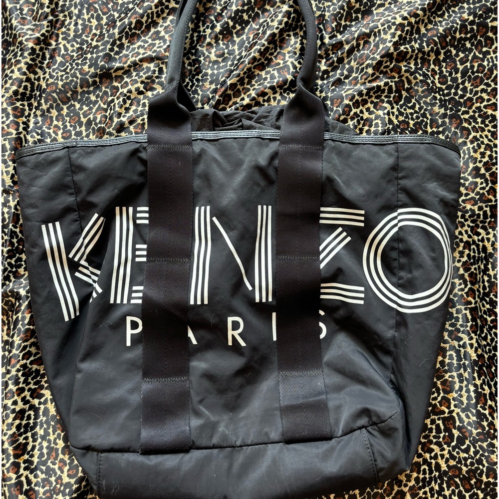 Kenzo Paris black tote bag and zipper pocket inside.
Dust bag included